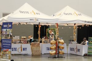 Nelson Farms operated the Taste New York booth at the New York State Fair this past summer. The farm operates a food processing incubator that enables other businesses to develop their own private label goods to sell as their own. Photo by Deborah Jeanne Sergeant