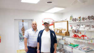 Real estate broker Bill Galloway and Ron Regan (left). They formed a partnership, along with Jeff McCrobie, a former Oswego fire chief; and Diego Lebaudy, a local lawyer, to reopen Stone’s Homemade Candy Shop. Reagan was the owner.