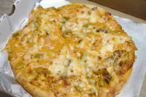 Chicken riggie pizza: chicken riggies, thick sauce, hearty pieces of chicken, peppers, and not overly spicy. 