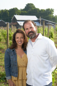 Ana Maria and husband Joe Murabito at their new Baldwinsville vineyard, Strigo Farmhouse, July 2. Photo by Chuck Wainwright. 
