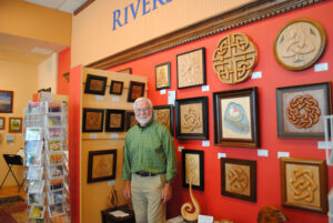 Carl Patrick’s medium is woodworking and among his specialties are Celtic knot-wood plaques.