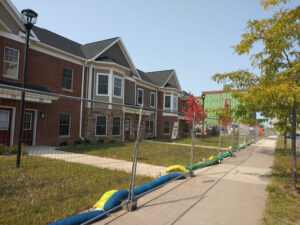 Eighteen townhouse are being built as part of the Harbor View Square project (opposite photo).