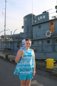 Dawn Ellis, 11, of Oswego, is pictured with Flat Sailor Sam in front of the National Historic Landmark Tugboat LT-5 in Oswego’s Historic Maritime District. The Canal to Shore Challenge -- sponsored in part by the Erie Canalway National Heritage Corridor and the New York State Canal Corporation -- was developed to allow families to learn about the area’s maritime history remotely. LT-5 is one of the sites of interest. 