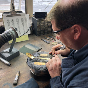 Eric Lawrence tools and designs a piece of flatware.