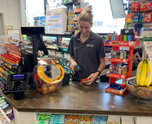 Morgan Delles, the store manager at Delles Corner Store in Syracuse, has received no responses to an employment ad posted for two months. “I think people don’t want to work when you could sit at home and get extra money from unemployment,” she says.