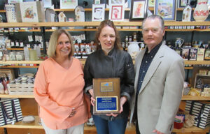Ellen Holst, OOC board president, Rebekah Alford, owner and chef at Rainbow Shores and Mill House Market Deli & Bakery, and L. Michael Treadwell, OOC executive director.