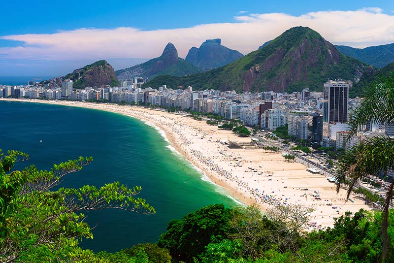 The Copacabana Beach, a 2.5-mile stretch of sand, is famed for girl watching. 